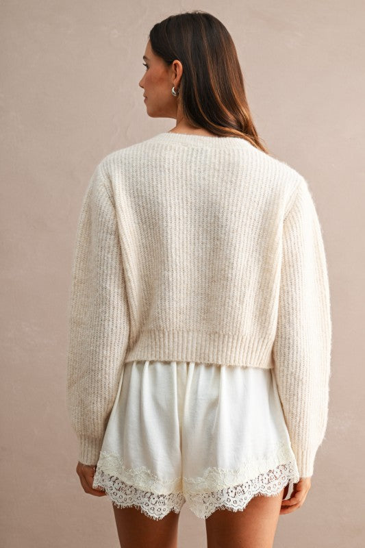 Cream Cardigan with Black Buttons