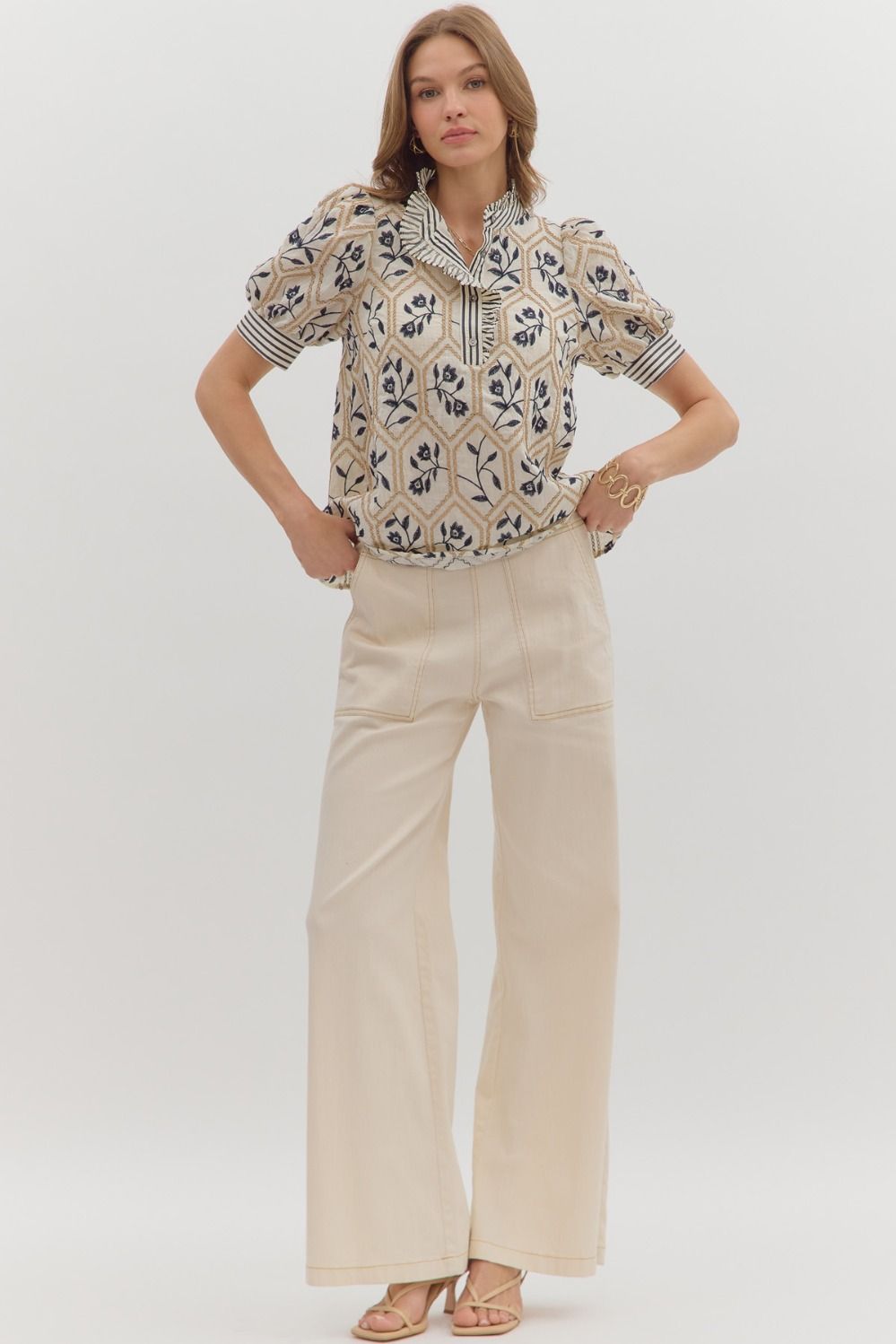 Cream Top with Navy Embroidered Floral Pattern